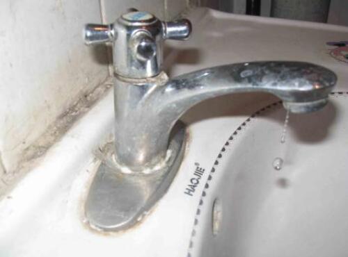 faucet with hard water scale