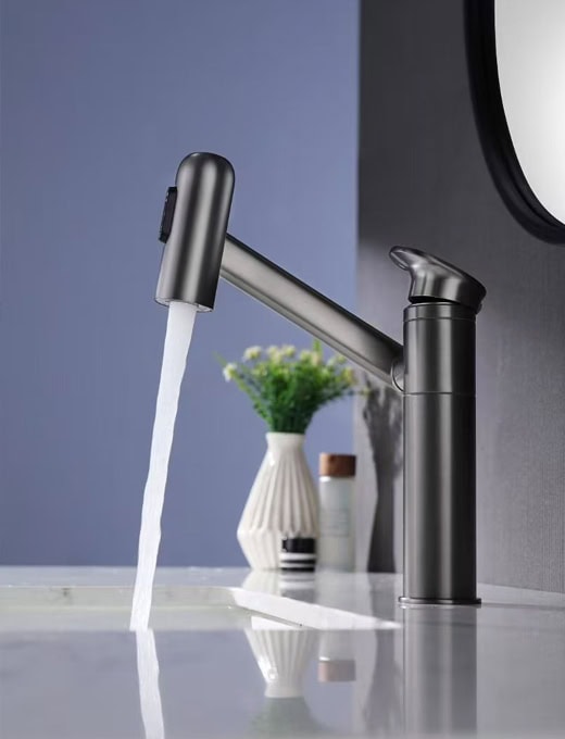 A-Torneira modern matte black kitchen faucet with single handle and pull-out spray, installed on a white countertop.