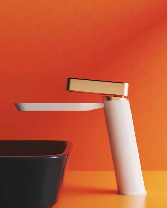 White kitchen faucet with gold handle, modern design for contemporary kitchens.
