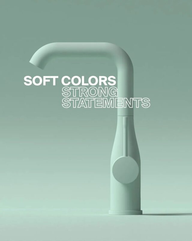 Modern pastel-colored kitchen faucet with smooth curves and minimalist style.