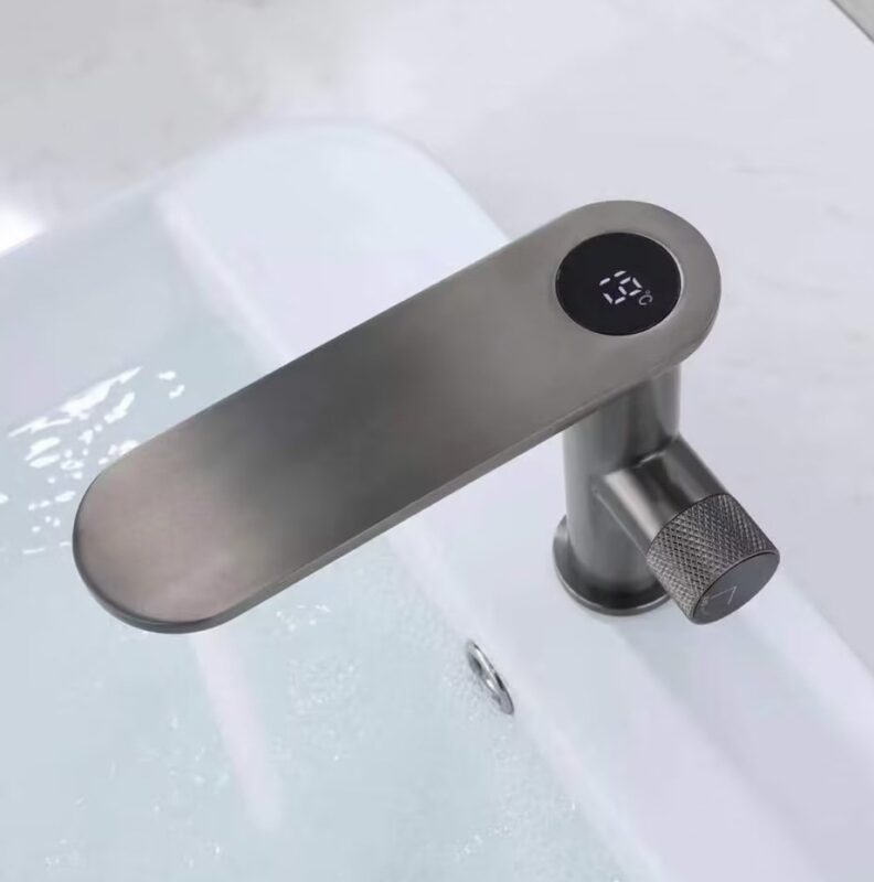 Touchless stainless steel kitchen faucet with LED temperature display.