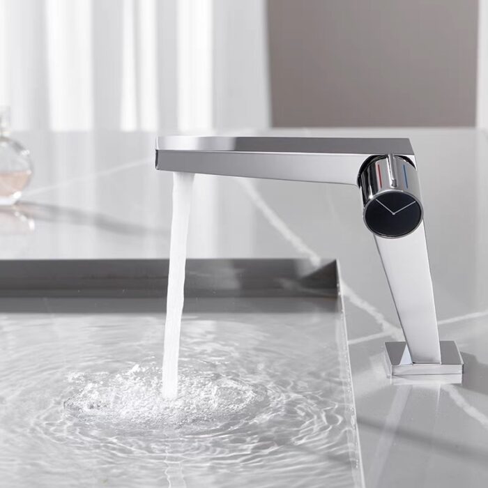 Sleek modern kitchen faucet with flowing water for stylish, functional sink setup.
