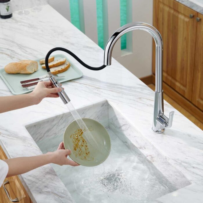 Sleek modern kitchen faucet with pull-down sprayer for comfortable use and stylish design.