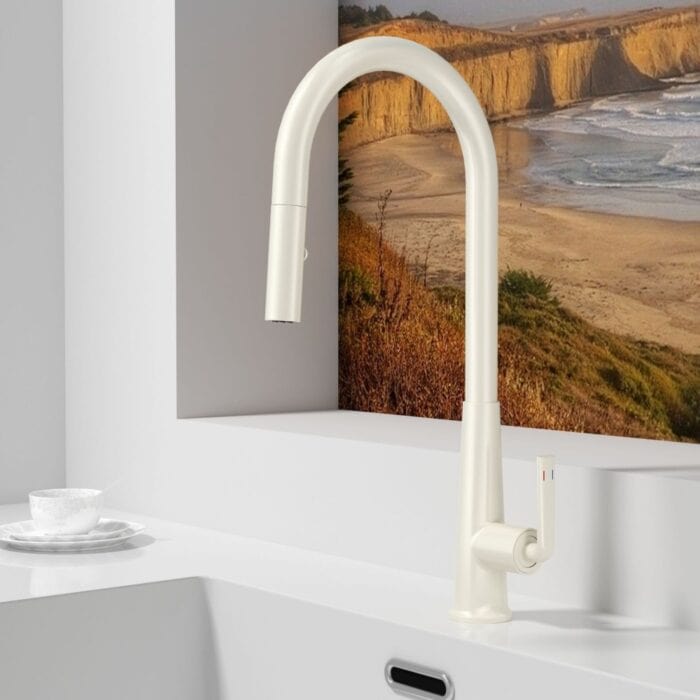 Modern white kitchen faucet with high-arc design and single handle for trendy, functional kitchen updates.