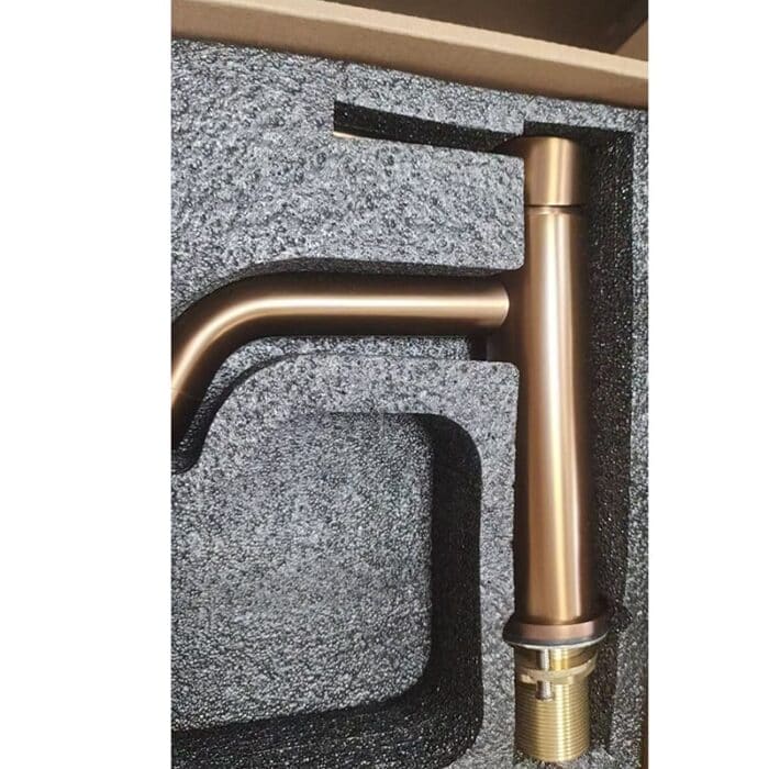 Modern matte gold kitchen faucet with sleek design, sturdy installation hardware, and durable construction.