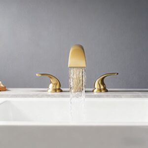 Elegant gold bathroom faucet with modern design and water flowing, stylish sink fixture.