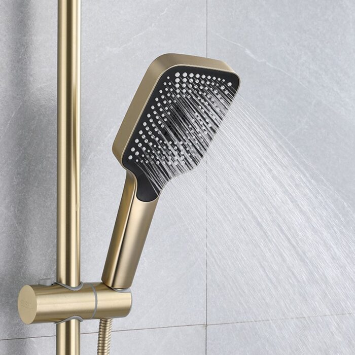 Brass rain shower head with multiple spray options for luxurious bathroom experience.