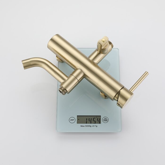 Brass kitchen faucet on digital scale, modern design, high-quality finish, lightweight, ideal for home improvements.