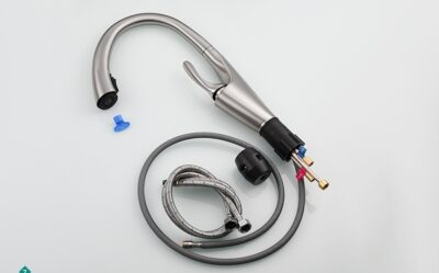 Flexible kitchen faucet with installation parts, stainless steel finish, and water supply connectors.