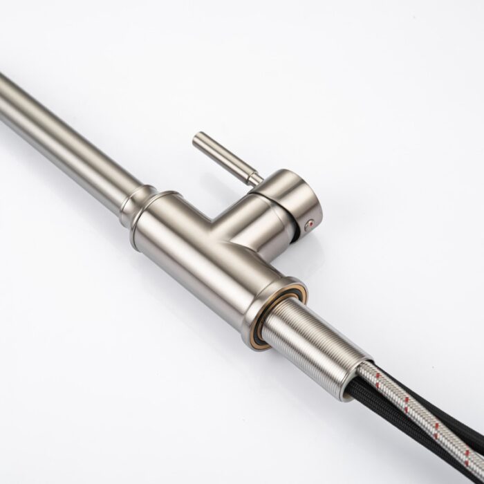 Modern stainless steel kitchen faucet with flexible hose for easy use and durability.