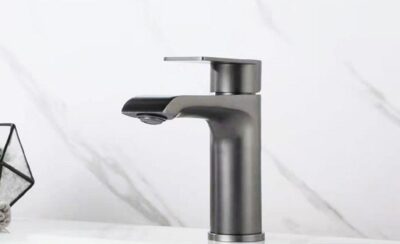 Sleek modern black matte kitchen faucet with single handle software design.