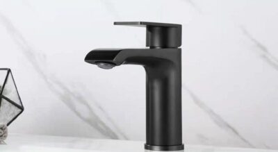 Sleek black modern kitchen faucet with matte finish, stylish design, perfect for contemporary bathroom or kitchen decor.
