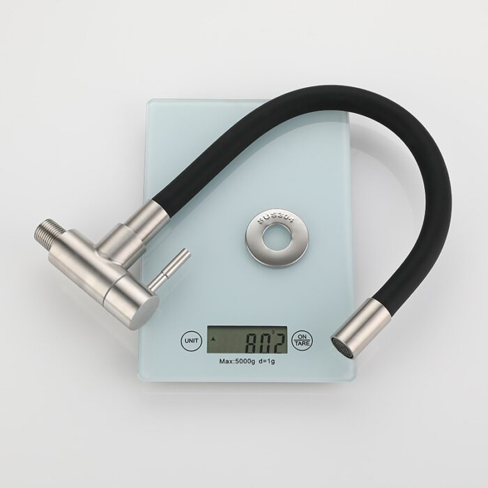 Sleek modern kitchen faucet with matte black finish and stainless steel details.