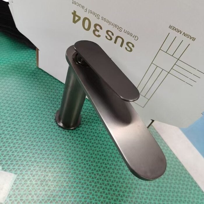 Modern stainless steel kitchen faucet, sleek design for easy use and durability.