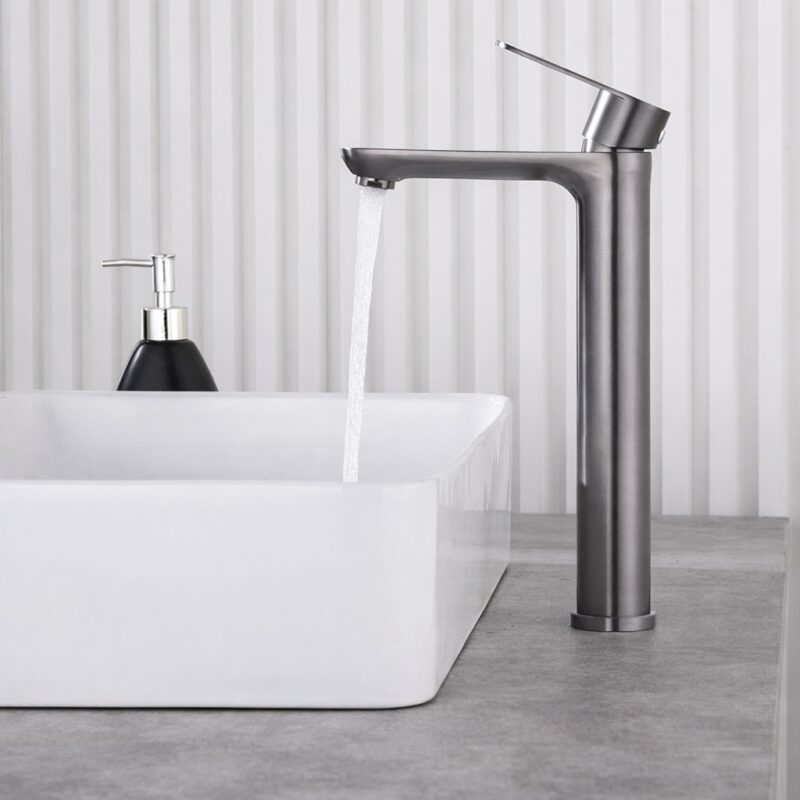 Sleek stainless steel kitchen faucet with water flow, modern design, and easy-to-use handle.