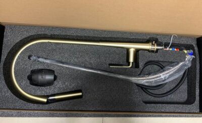 Sleek gold kitchen faucet with pull-down spray head perfect for modern kitchens.